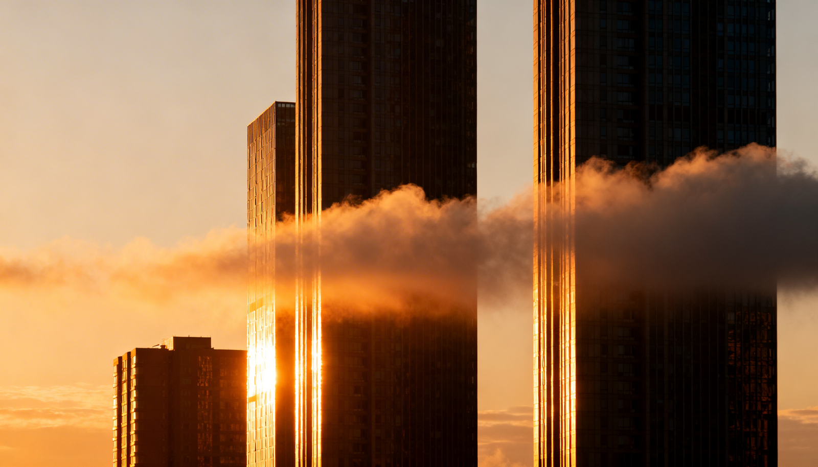 Golden Sunrise City Buildings Above Clouds Photo